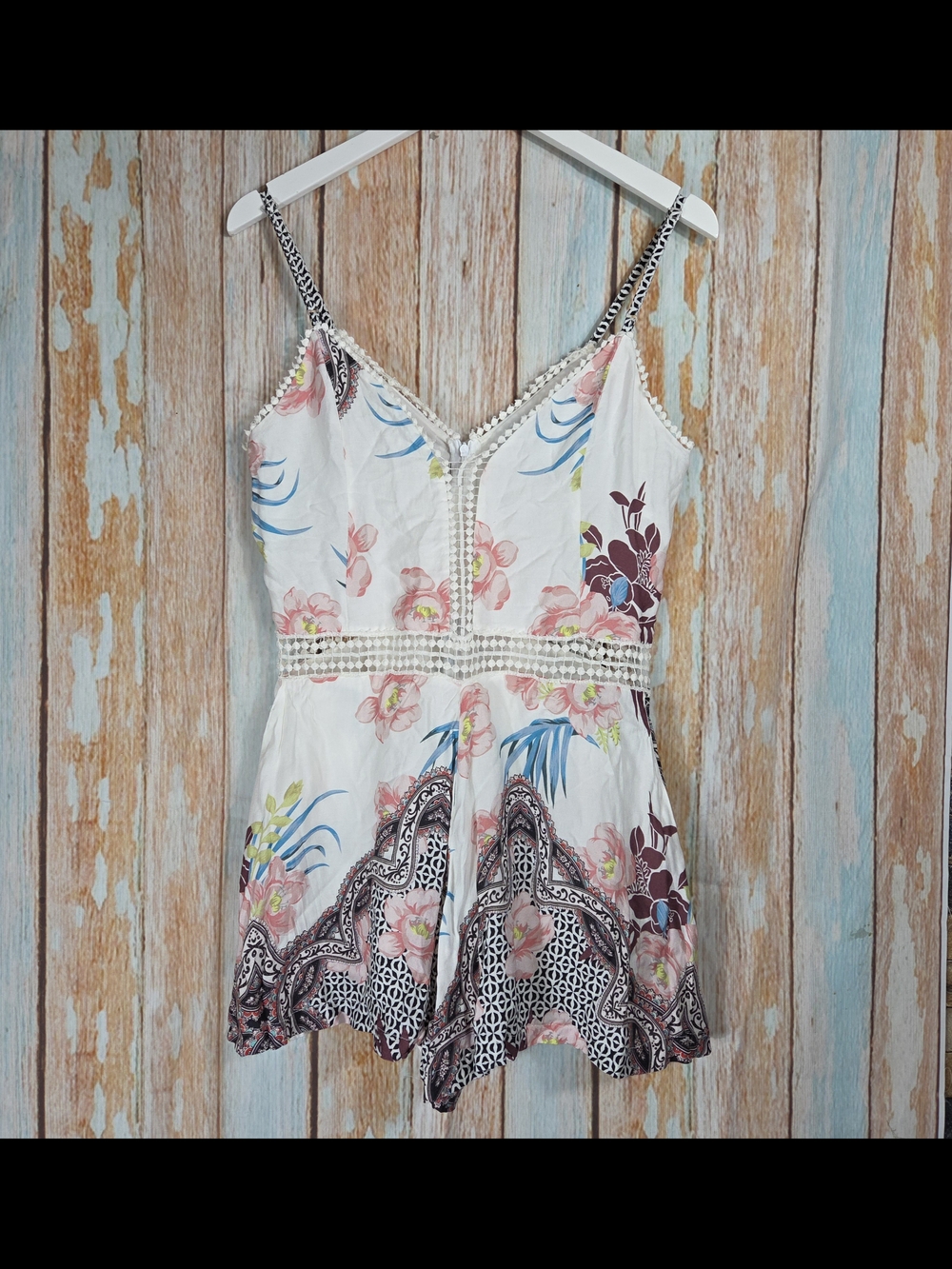 Dolce Vita Cream Floral Romper. Spaghetti Straps And Pockets